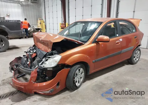 2009 Kia Rio Lx z USA, uszkodzony, nr VIN KNADE223X96447092